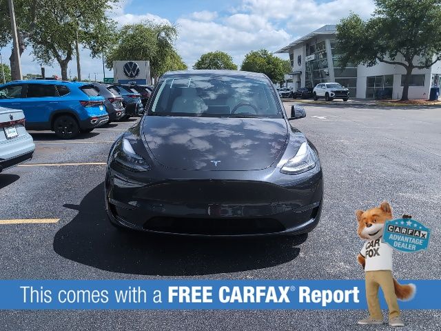 Used 2025 Tesla Model Y Long Range with VIN 7SAYGDEE7SF296457 for sale in Sanford, FL