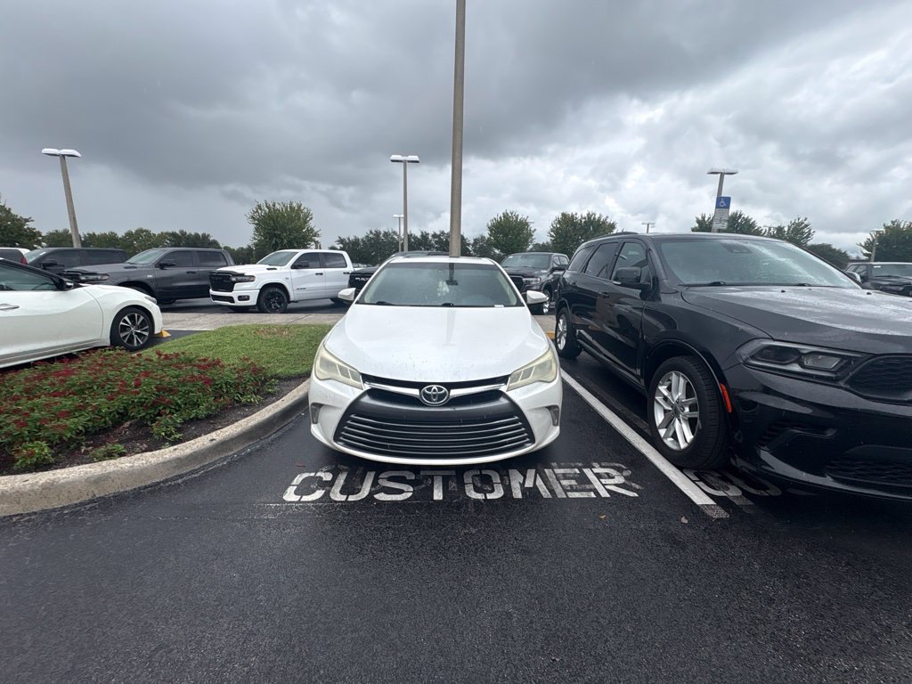 Used 2016 Toyota Camry XLE with VIN 4T1BK1FKXGU572838 for sale in Kissimmee, FL
