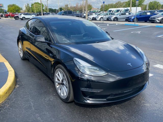 Used 2021 Tesla Model 3 Base with VIN 5YJ3E1EB8MF901879 for sale in Kissimmee, FL