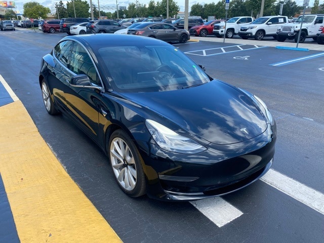 Used 2019 Tesla Model 3 Base with VIN 5YJ3E1EB9KF199973 for sale in Kissimmee, FL