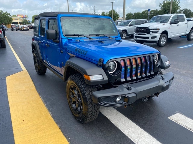 Used 2022 Jeep Wrangler Unlimited Willys Sport with VIN 1C4HJXDM8NW258356 for sale in Kissimmee, FL