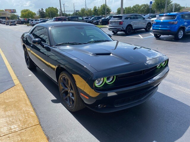 Certified 2021 Dodge Challenger SXT with VIN 2C3CDZAG2MH514293 for sale in Kissimmee, FL