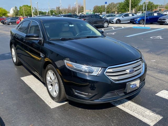 Used 2017 Ford Taurus SEL with VIN 1FAHP2E8XHG135990 for sale in Kissimmee, FL