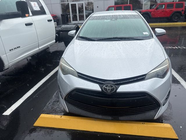 Used 2018 Toyota Corolla LE with VIN 5YFBURHE0JP825433 for sale in Kissimmee, FL