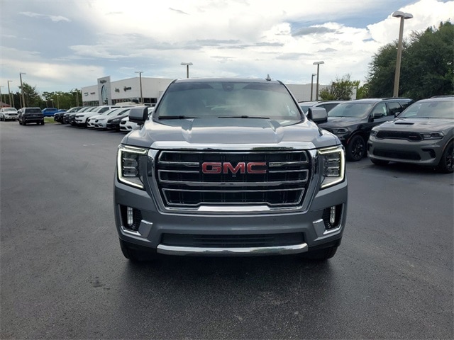 Used 2022 GMC Yukon SLT with VIN 1GKS1BKD2NR262045 for sale in Kissimmee, FL