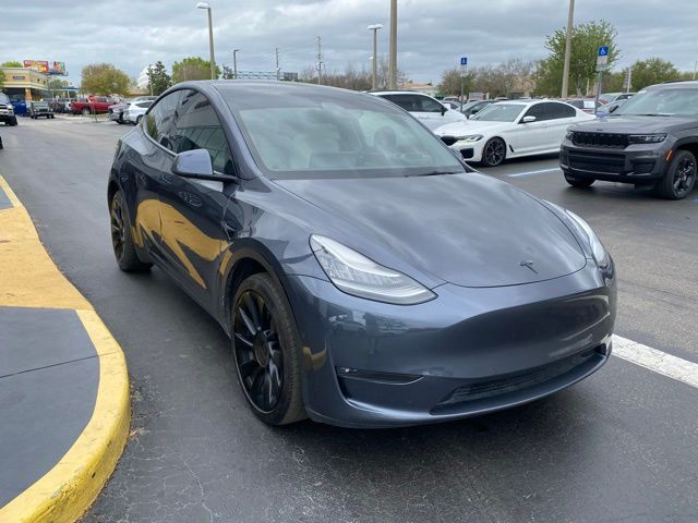 Used 2021 Tesla Model Y Long Range with VIN 5YJYGDEE4MF116285 for sale in Kissimmee, FL