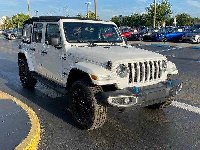Used 2023 Jeep Wrangler 4xe Sahara 4XE with VIN 1C4JJXP6XPW580286 for sale in Kissimmee, FL