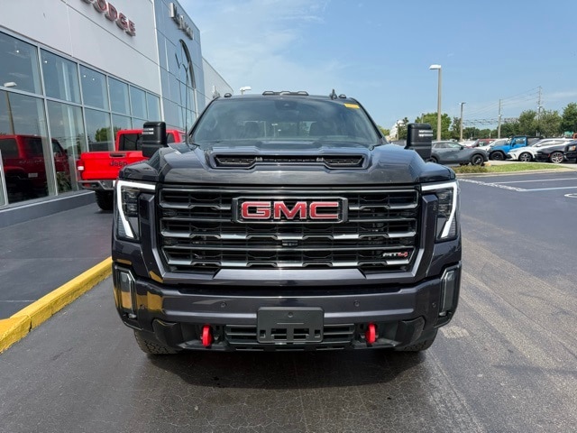 Used 2024 GMC Sierra 3500HD AT4 with VIN 1GT49VEY3RF130982 for sale in Kissimmee, FL