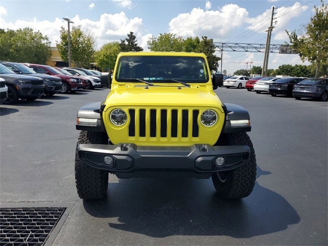 Certified 2022 Jeep Wrangler Unlimited High Tide with VIN 1C4HJXDG7NW246970 for sale in Kissimmee, FL