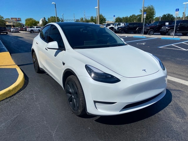 Used 2024 Tesla Model Y Long Range with VIN 7SAYGDED7RA325941 for sale in Kansas City