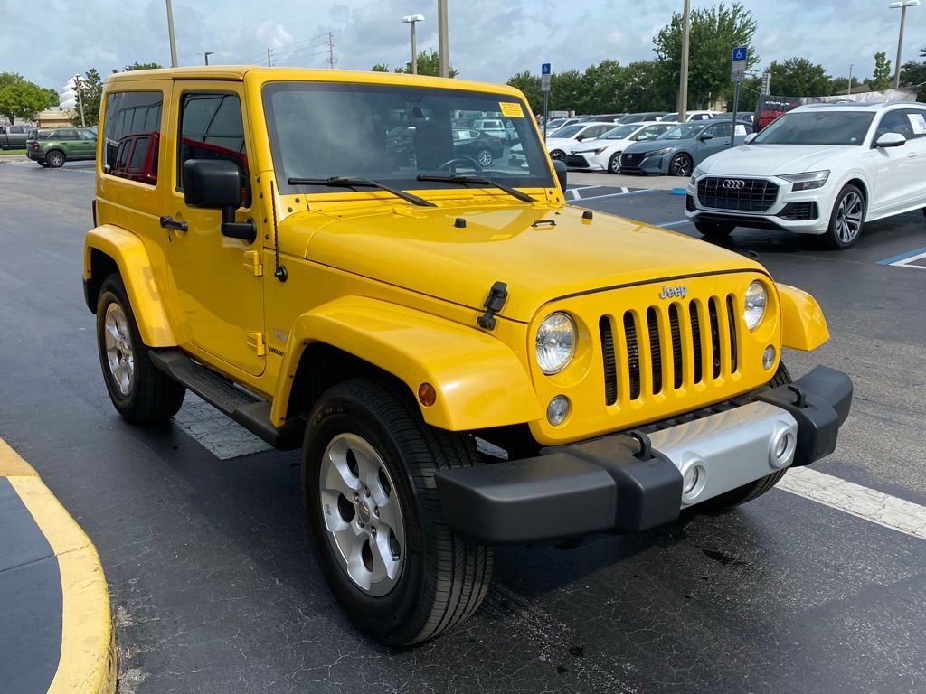 Used 2015 Jeep Wrangler Sahara with VIN 1C4AJWBG1FL620426 for sale in Kissimmee, FL