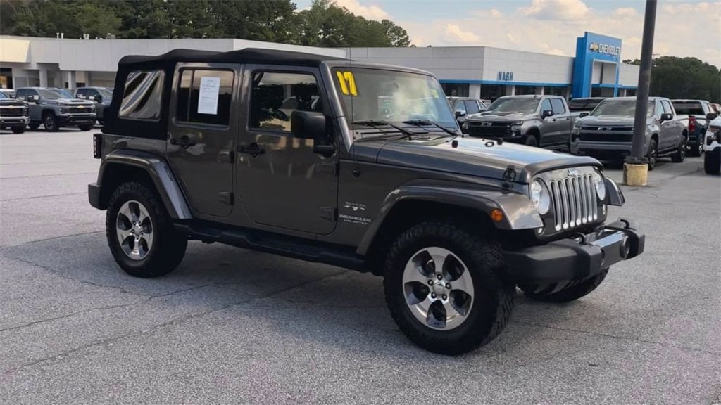 Used 2017 Jeep Wrangler Unlimited Sahara with VIN 1C4BJWEGXHL567664 for sale in Lawrenceville, GA