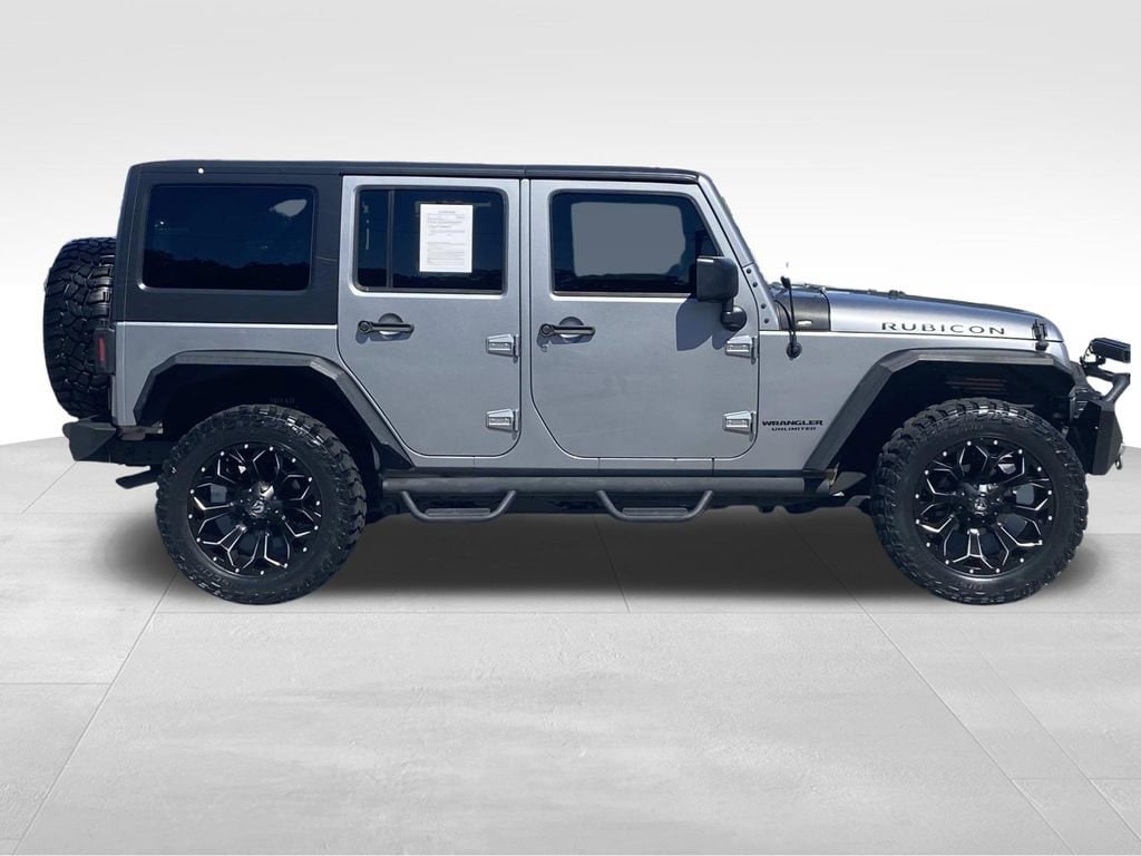 Used 2014 Jeep Wrangler Unlimited Rubicon with VIN 1C4BJWFG2EL327695 for sale in Lawrenceville, GA