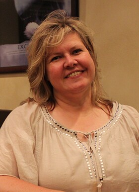 Staff member Suzie Byrd from ae387a1371f4