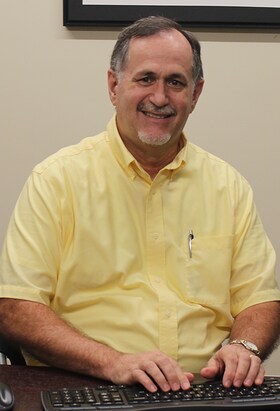 Staff member Paul Holmes from ae387a1371f4