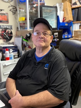 Staff member Lester Eller from 4c51a2325048
