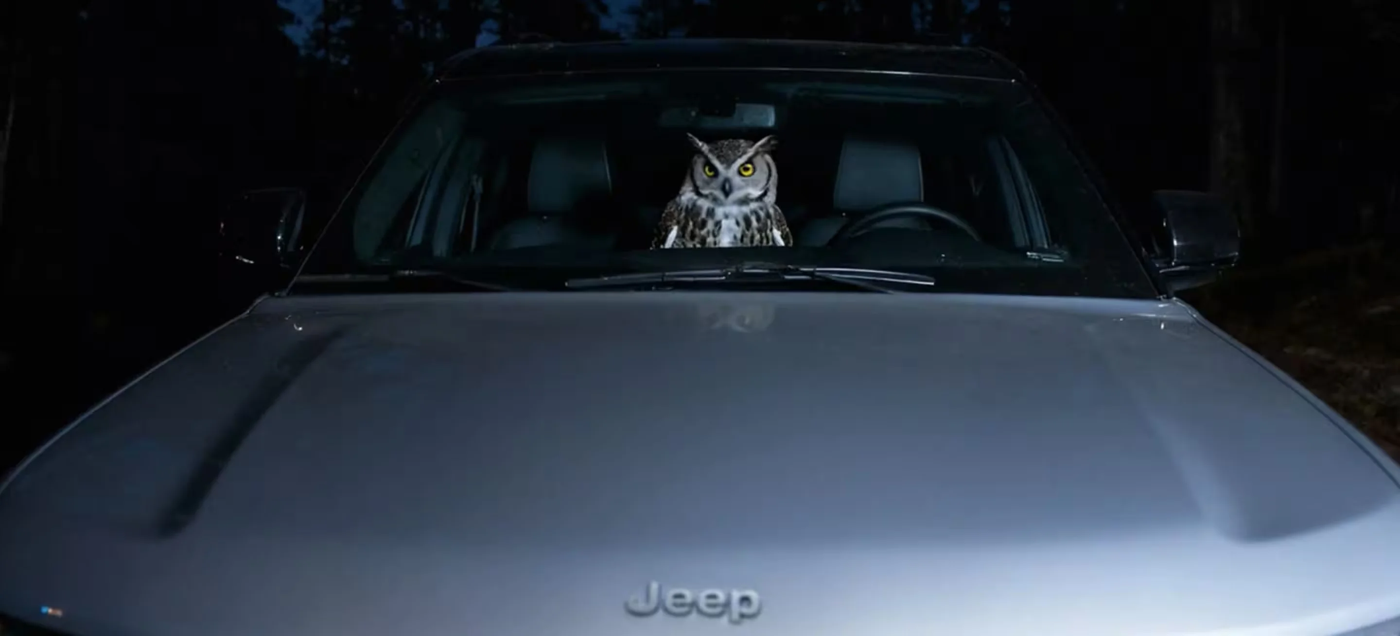 The windshield and hood on a 2026 Jeep Grand Cherokee Summit, the trim that now runs the 2.0L Hurricane Turbo I4 instead of a V8