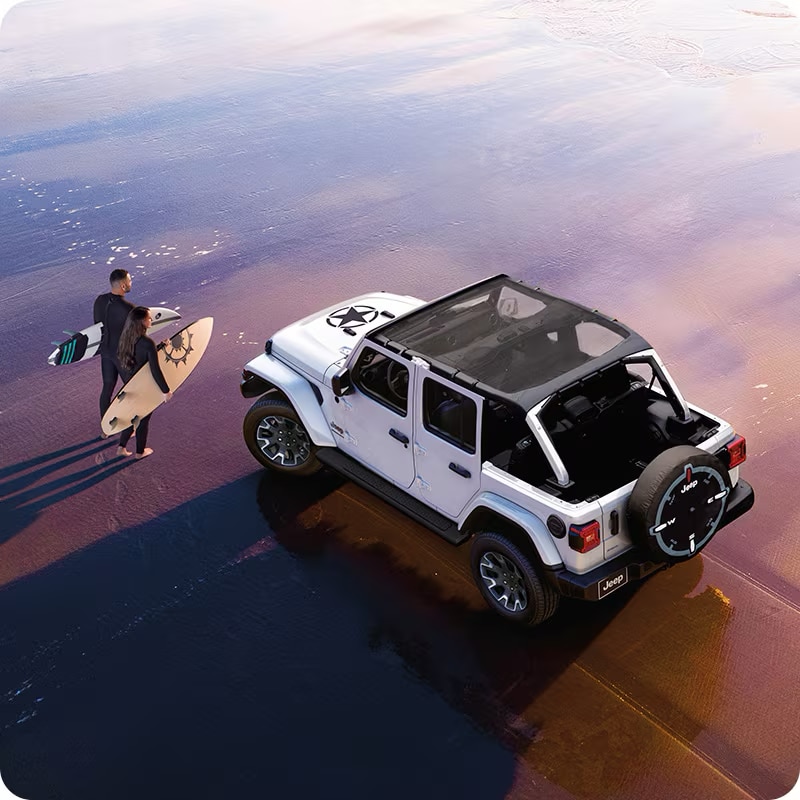 2026 Jeep Wrangler at the beach loaded for a trip