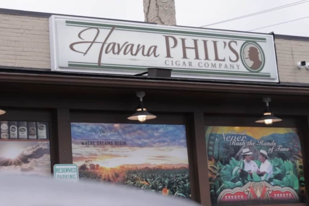 Storefront of Havana Phil's Cigar Lounge, where a recent Land Rover Greensboro event was hosted