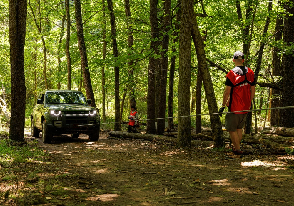 land rover Greensboro crew outdoors competing in an obstacle course