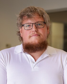 Staff member Zach Beyers from ID_979553