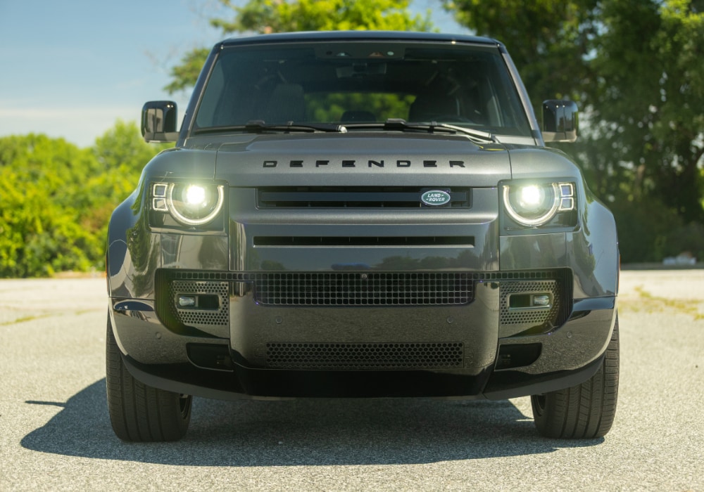 land-rover-defender-110-for-sale.png Land Rover Defender 110 with its headlights on