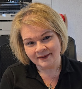 Staff member Lorena Bumgarner from ID_ee400c7a1d22