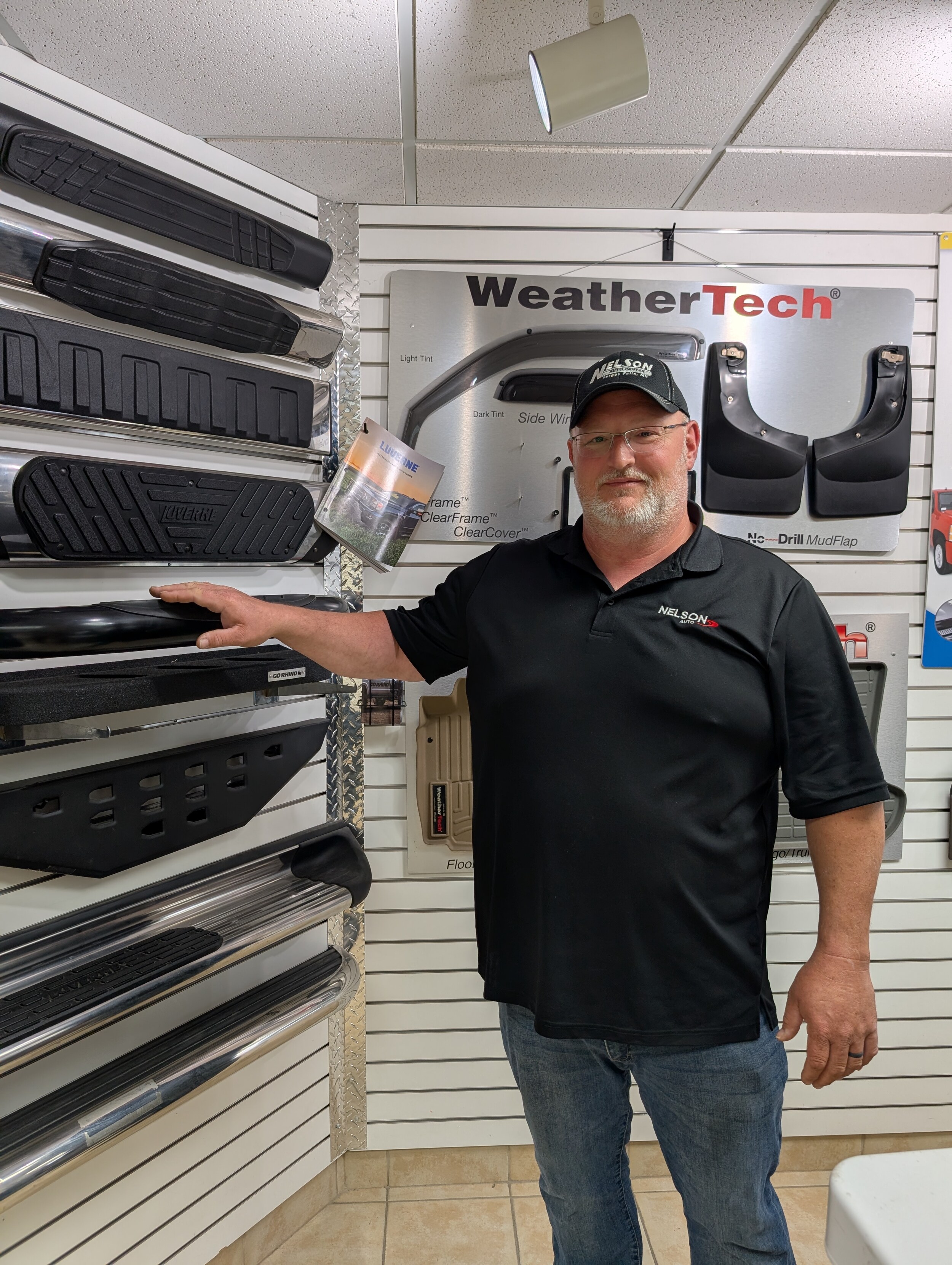  Person cheerfully signing documents.