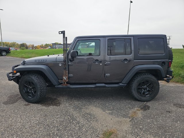 Used 2018 Jeep Wrangler Unlimited Willys Wheeler with VIN 1C4BJWDGXJL826791 for sale in Fergus Falls, Minnesota