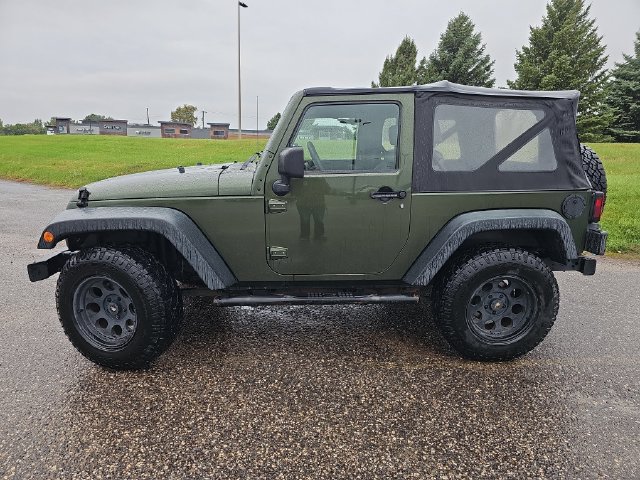 Used 2009 Jeep Wrangler X with VIN 1J4FA24169L734704 for sale in Fergus Falls, Minnesota