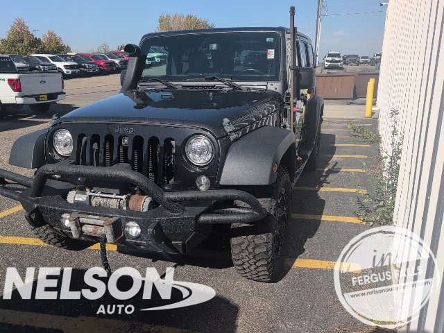 Used 2018 Jeep Wrangler Unlimited Willys Wheeler with VIN 1C4BJWDGXJL826791 for sale in Fergus Falls, Minnesota