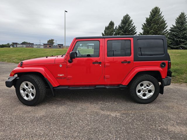 Used 2015 Jeep Wrangler Unlimited Sahara with VIN 1C4BJWEG9FL583755 for sale in Fergus Falls, Minnesota