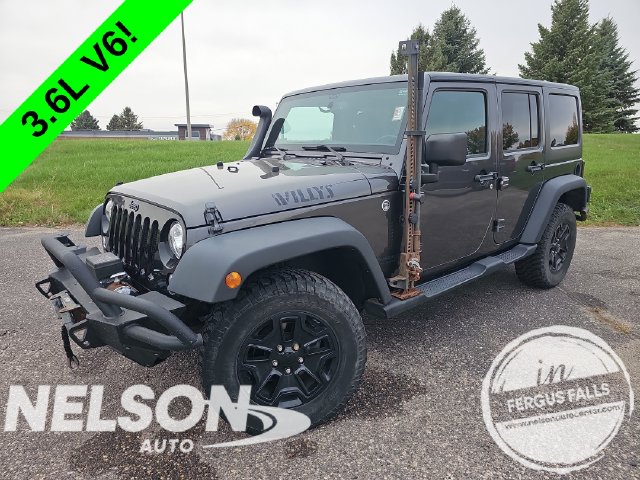 Used 2018 Jeep Wrangler Unlimited Willys Wheeler with VIN 1C4BJWDGXJL826791 for sale in Fergus Falls, Minnesota