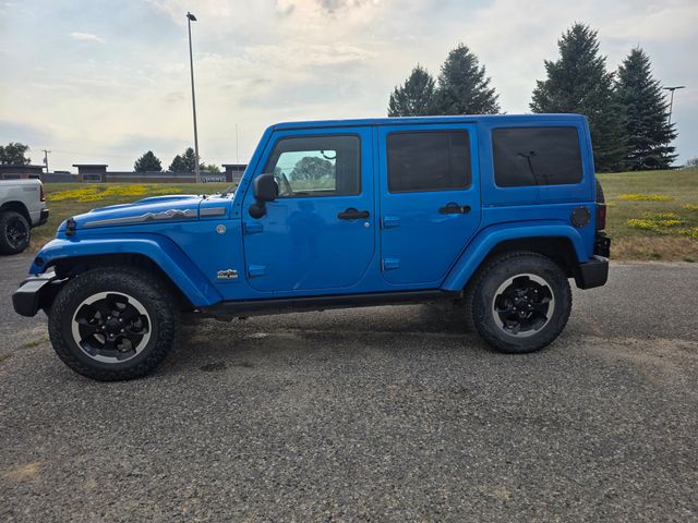 Used 2014 Jeep Wrangler Unlimited Sahara with VIN 1C4HJWEG1EL180989 for sale in Fergus Falls, Minnesota