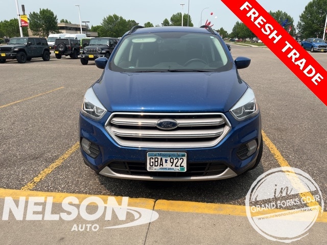 Used 2018 Ford Escape SEL with VIN 1FMCU9HD7JUC78087 for sale in Grand Forks, ND