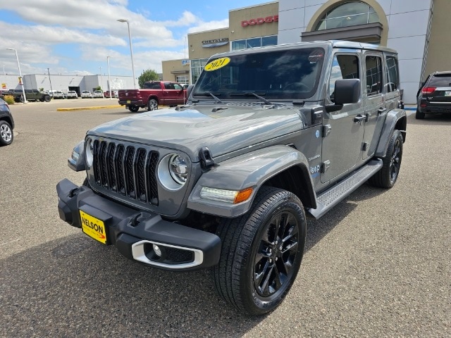 Used 2021 Jeep Wrangler Unlimited Sahara 4XE with VIN 1C4JJXP67MW857326 for sale in Grand Forks, ND