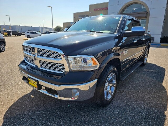 Used 2015 RAM Ram 1500 Pickup Laramie with VIN 1C6RR7NM5FS594378 for sale in Grand Forks, ND