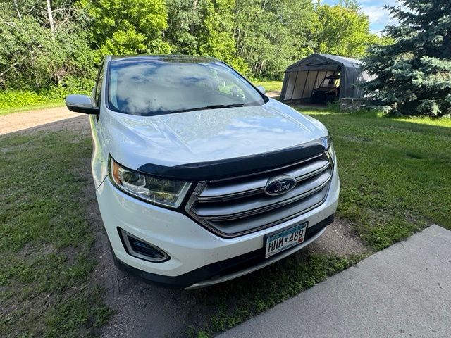 Used 2015 Ford Edge Titanium with VIN 2FMTK4K84FBC07513 for sale in Grand Forks, ND
