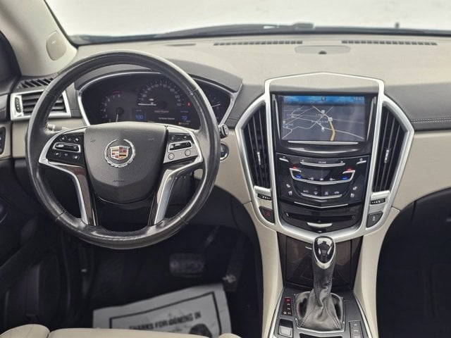 Used 2015 Cadillac SRX Premium Collection with VIN 3GYFNGE38FS551246 for sale in Fergus Falls, Minnesota