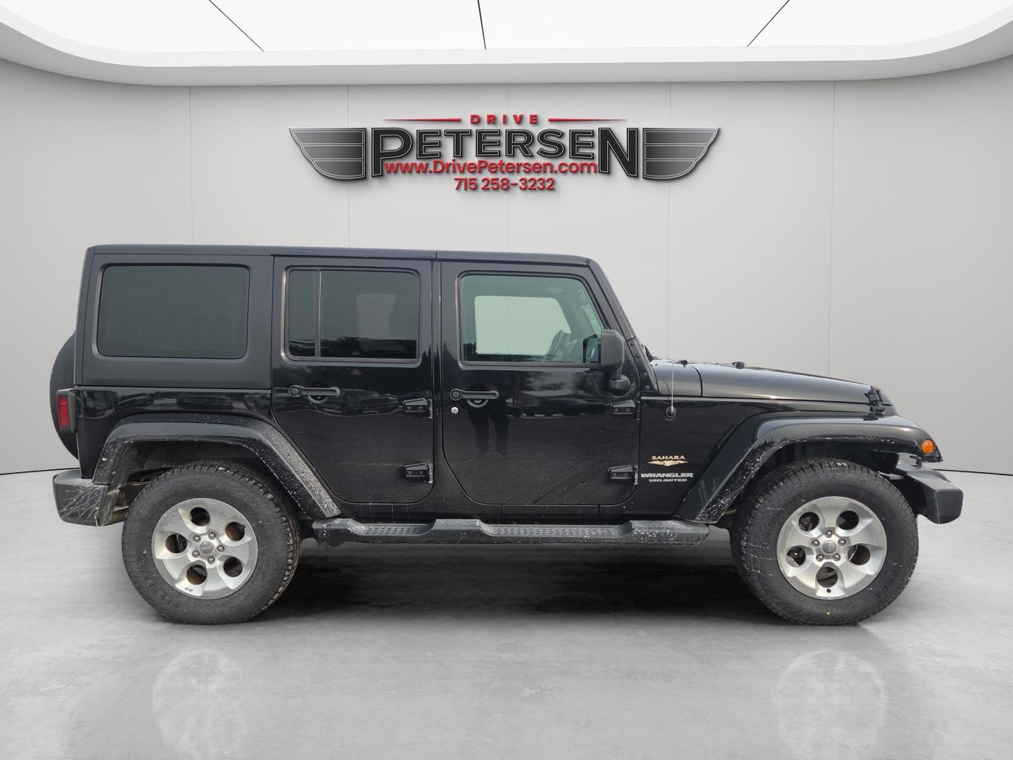 Used 2015 Jeep Wrangler Unlimited Sahara with VIN 1C4BJWEG9FL767898 for sale in Waupaca, WI