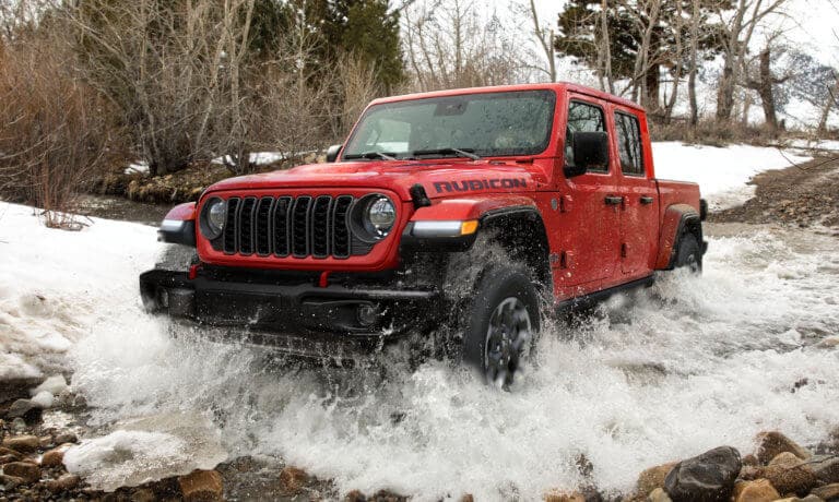 2025 Jeep Gladiator Exterior Driving Through Stream