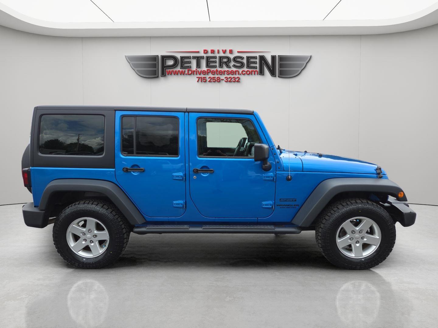 Used 2015 Jeep Wrangler Unlimited Sport with VIN 1C4BJWDG5FL558546 for sale in Waupaca, WI
