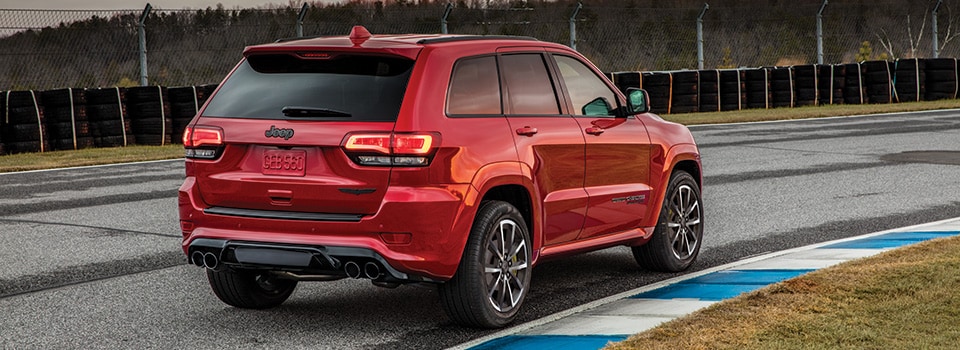 Red Jeep Grand Cherokee reaexterior view