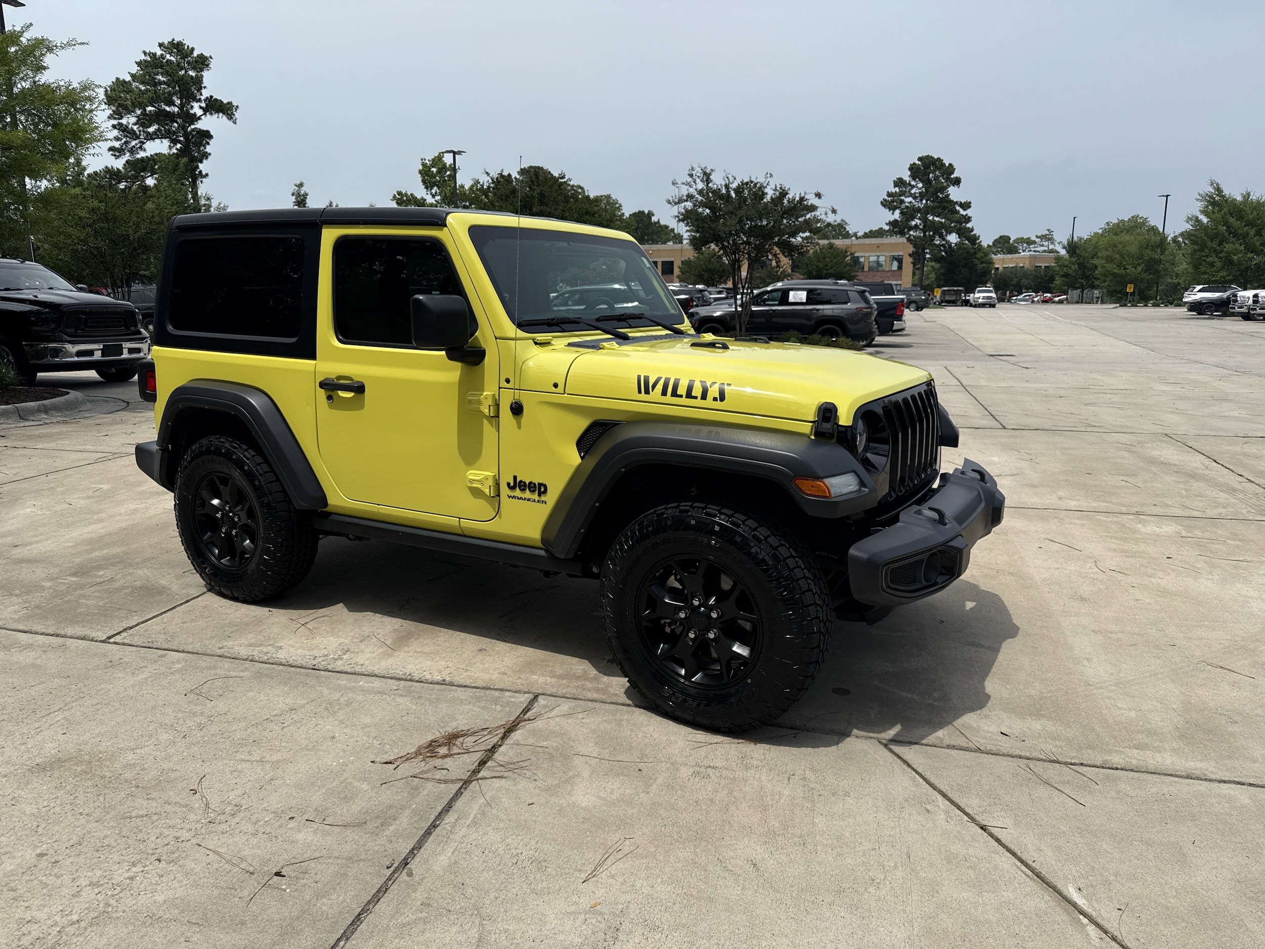 Used 2022 Jeep Wrangler Willys with VIN 1C4GJXAG9NW227014 for sale in Wilmington, NC