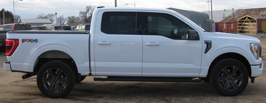Used 2023 Ford F-150 XLT with VIN 1FTFW1E84PKE28570 for sale in Kingman, KS