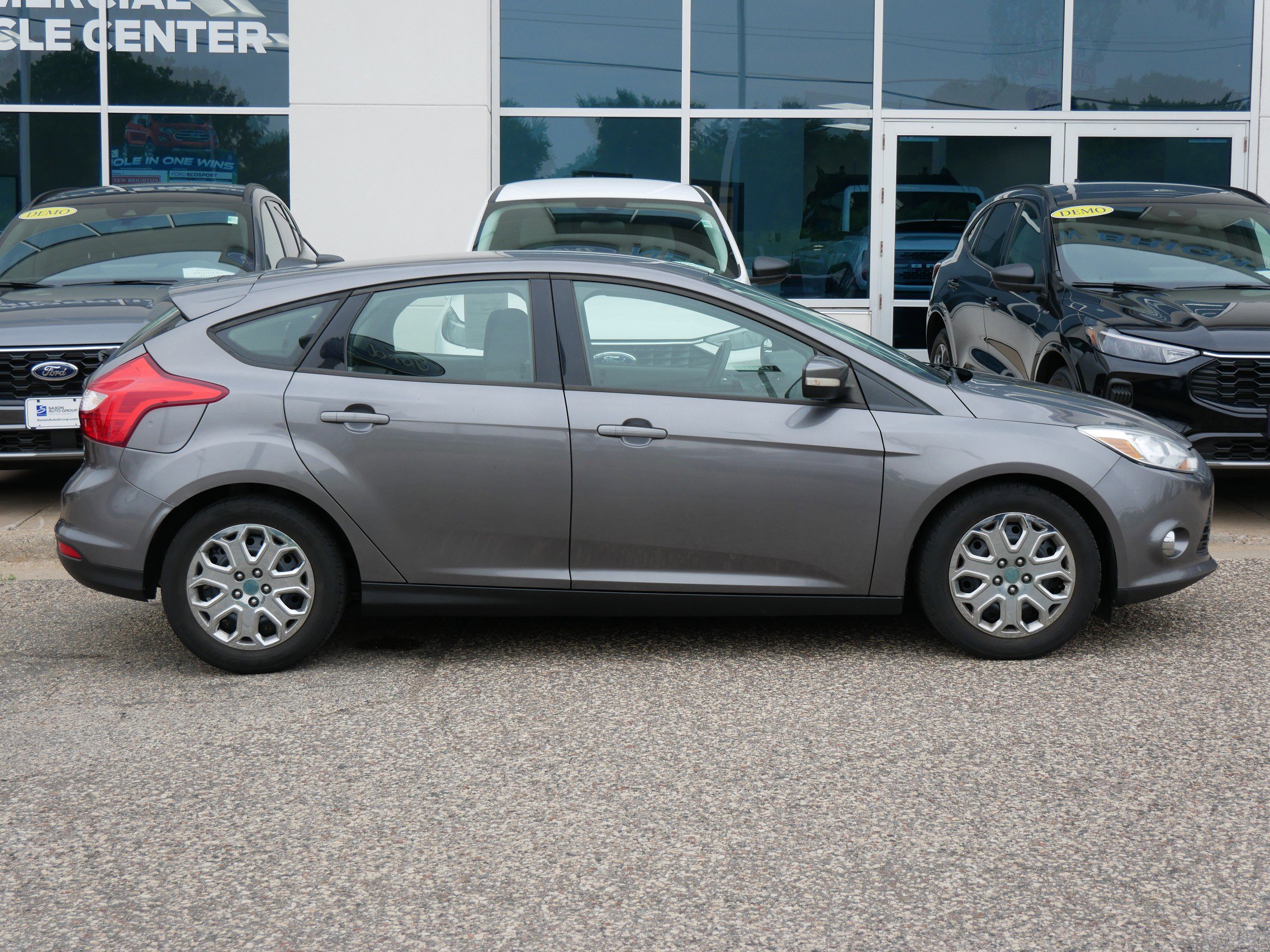 Used 2012 Ford Focus SE with VIN 1FAHP3K27CL409409 for sale in New Brighton, Minnesota