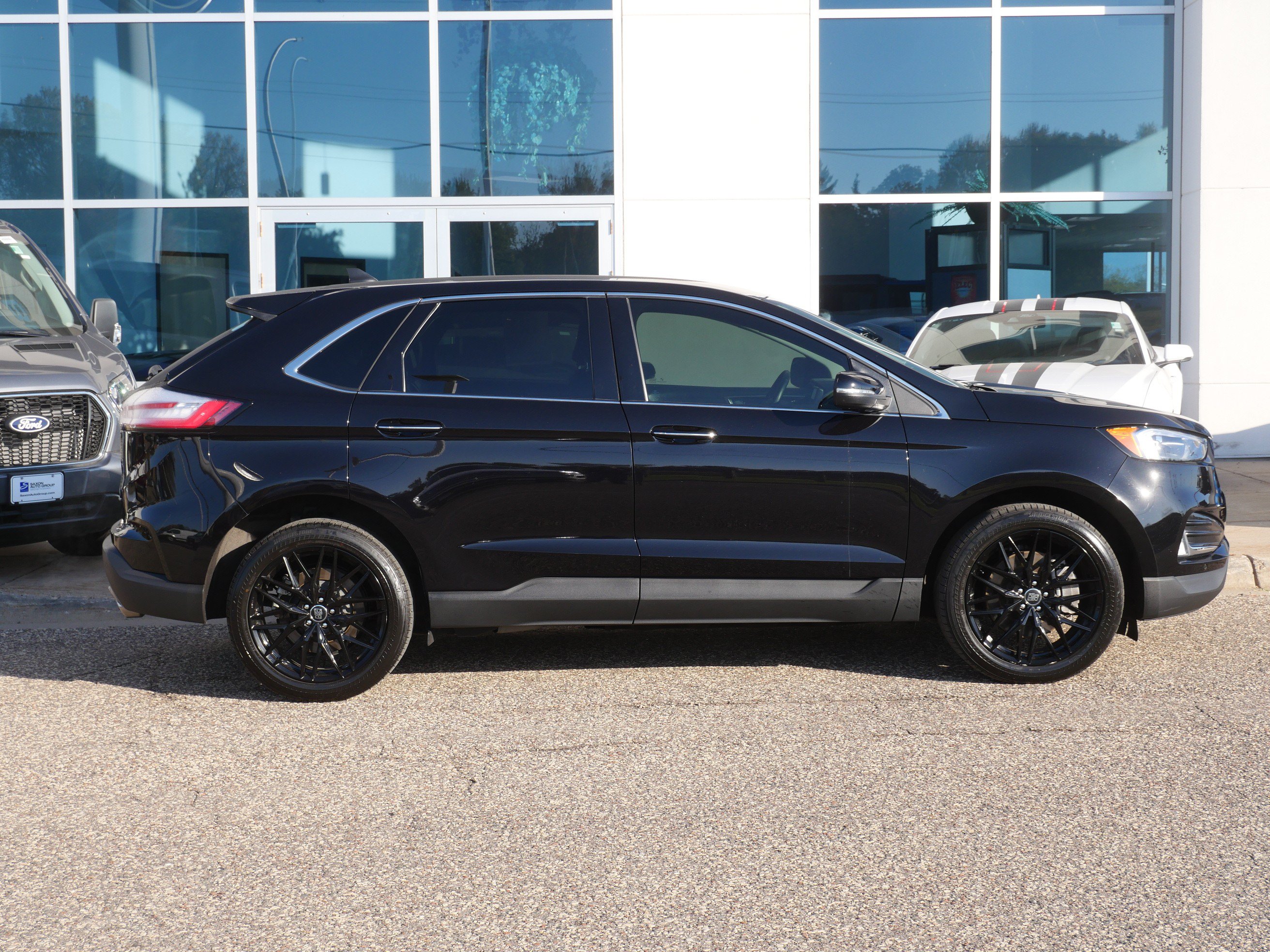 Used 2024 Ford Edge Titanium with VIN 2FMPK4K90RBA69001 for sale in New Brighton, Minnesota