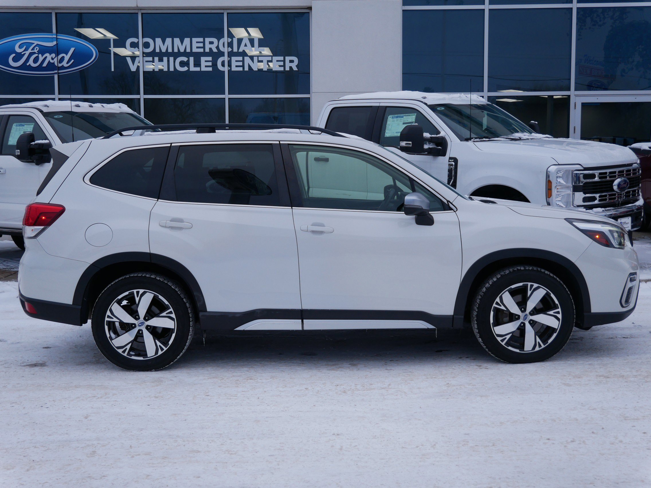 Used 2020 Subaru Forester Touring with VIN JF2SKAXC6LH560010 for sale in New Brighton, Minnesota