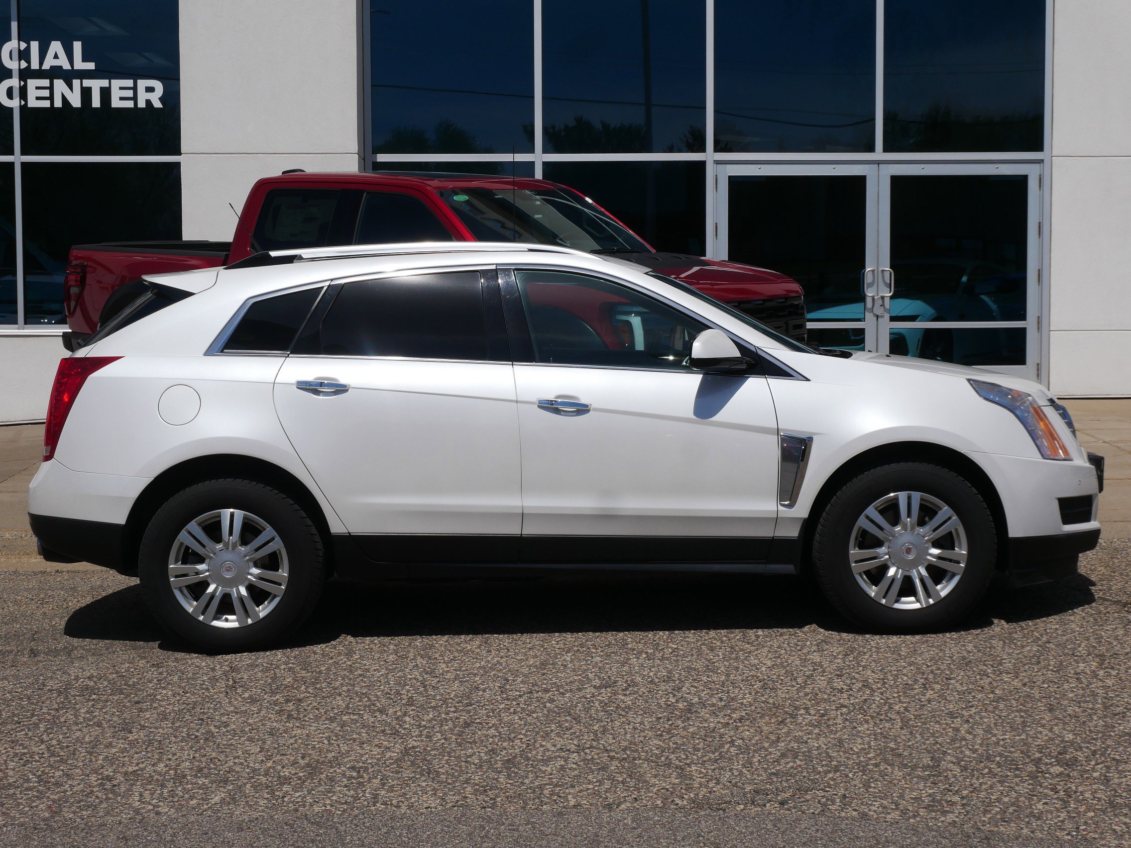 Used 2013 Cadillac SRX Luxury Collection with VIN 3GYFNGE36DS648152 for sale in New Brighton, Minnesota