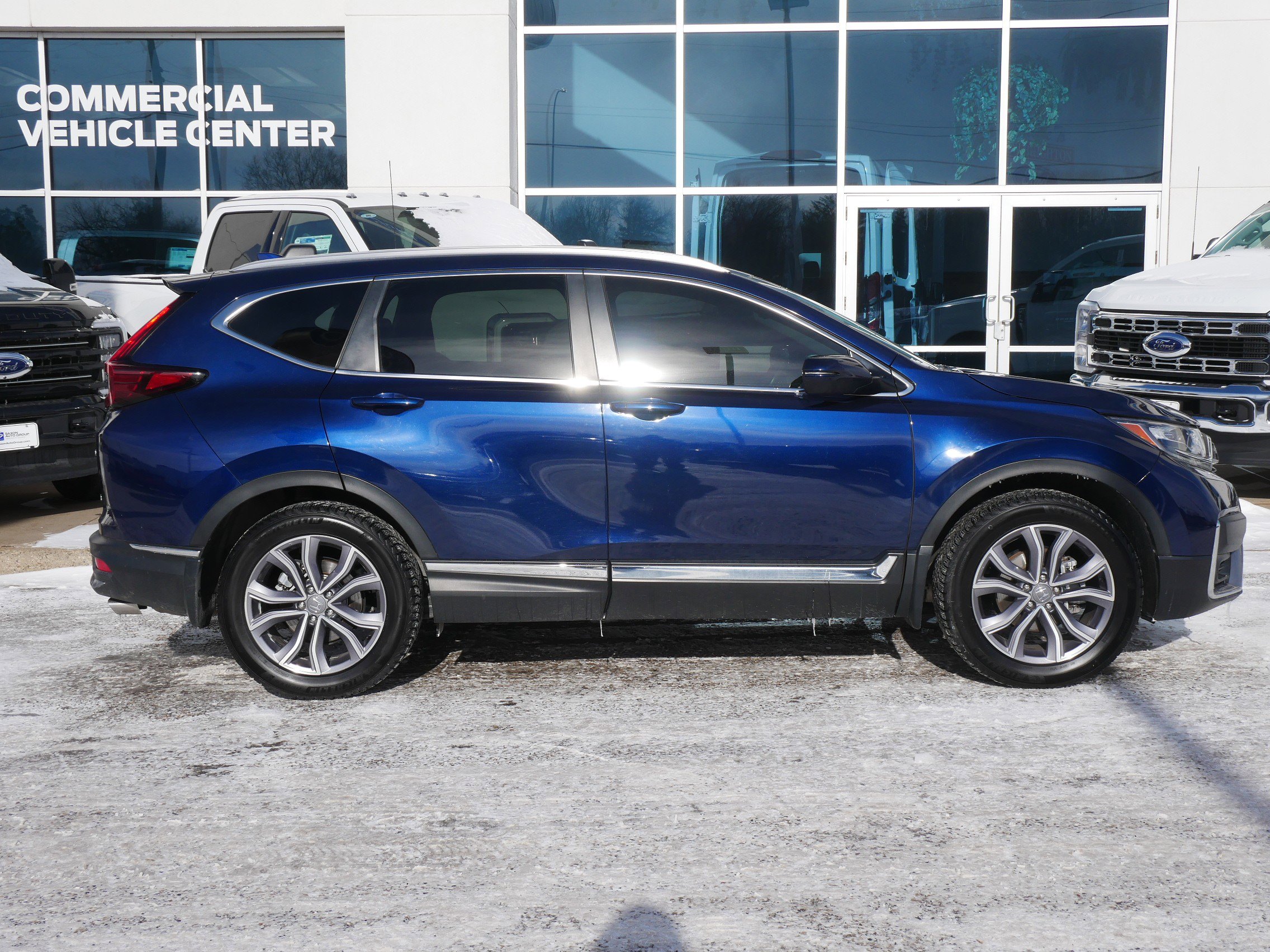 Used 2020 Honda CR-V Touring with VIN 5J6RW2H94LL020589 for sale in New Brighton, Minnesota
